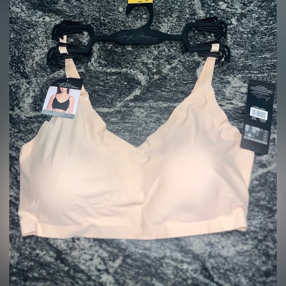 New medium peach silky feel sports bra